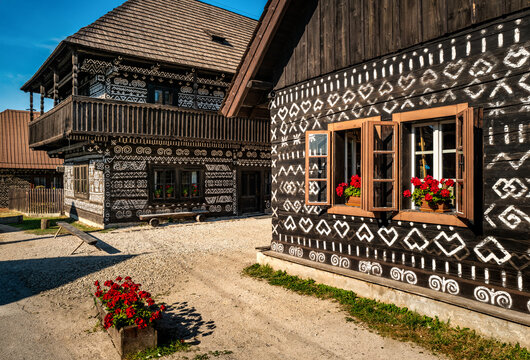 Cicmany, Slovakia - Traditional wooden houses with white decorative painted ornaments, UNESCO