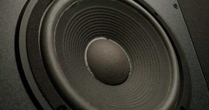 Music speaker during music playback, close-up, strong vibration