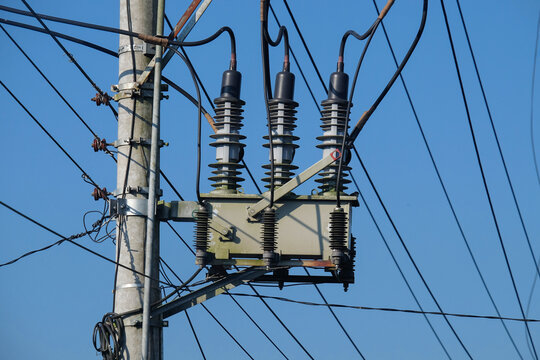 Recloser equipment at high voltage electrical substations. The device automatically cuts off electricity if a short circuit occurs