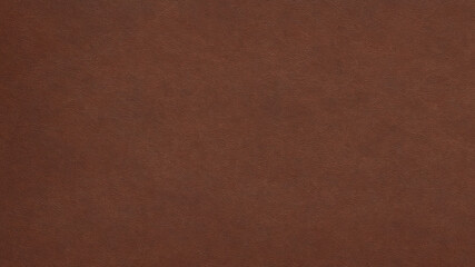 Texture of brown genuine leather. Background of dark luxurious skin
