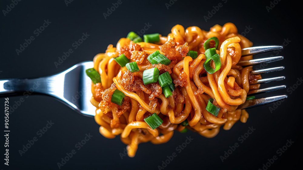 Sticker close-up of cooked noodles on a fork with green onions and crispy toppings, against a dark backgroun