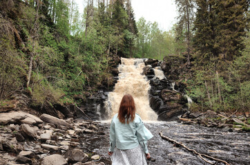 person sitting on a log