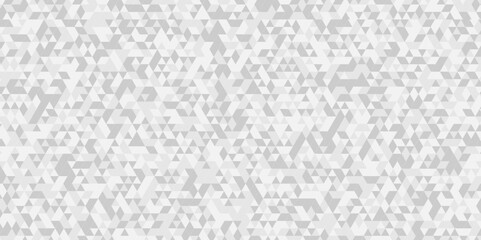 	
Vector geometric seamless technology gray and white diamond triangle background. Abstract digital grid light pattern white Polygon Mosaic triangle business and corporate background.