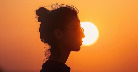 Silhouette of a Woman at Sunset