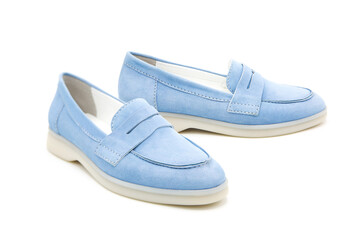 Pair of fashionable stylish suede loafer shoes isolated on white background. View from all sides.