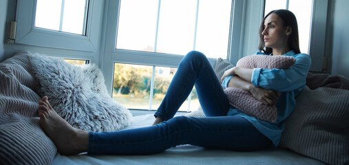 Sad, depressed, frustrated, angry, lonely, emotional young woman with severe stress and mental...