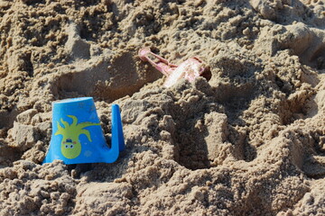 Children's sand toys on the beach.