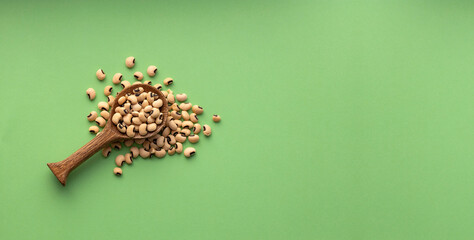 Cowpea beans in the spoon - Black-eyed peas. Alubia carilla