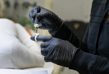 Beautician Preparing Pigment for Microblading Procedure