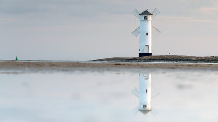 Panoramic image of an old lighthouse in Swinoujscie, a port in Poland on the Baltic Sea.