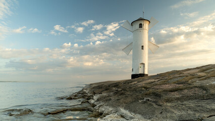 Panoramic image of an old lighthouse in Swinoujscie, a port in Poland on the Baltic Sea.
