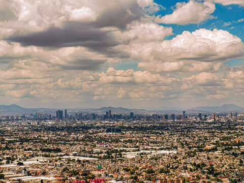 clouds over the skyline of Mexico City 