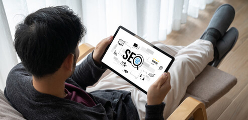 SEO search engine optimization for modish e-commerce and online retail business showing on computer...