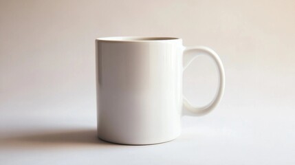 Fototapeta premium a white coffee mug sitting on top of a table