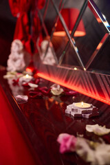 A beautiful Romantic Candlelit Setting adorned with Flowers and Grapes for special moments