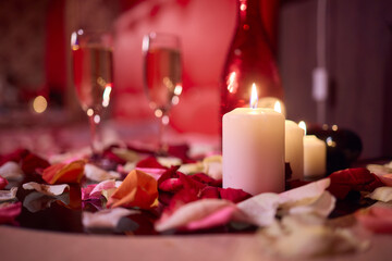 A beautiful Romantic Candlelit Setting adorned with Flowers and Grapes for special moments