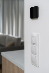 Modern light switch and smart home automation system in room