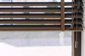Detailed view of a brown blinds covering a window