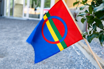 Sami nation flag in Nordland, Norway. Sami flag is the flag of Sami people, one of the Indigenous...