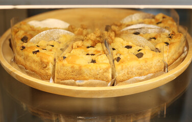 Cakes in glass display case ready for sale