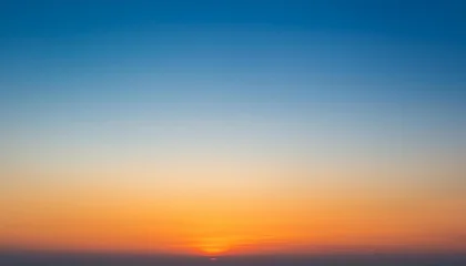 abstract gradient sunrise in the sky with blue and orange natural background