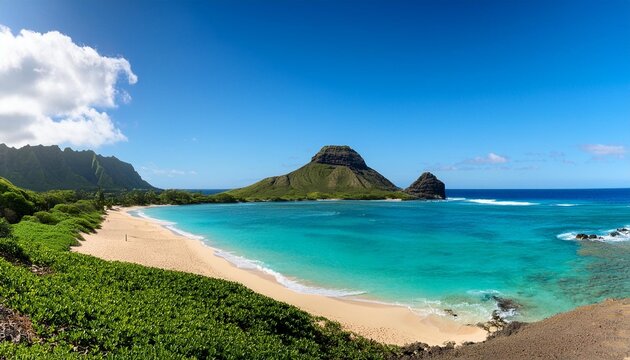 hidden beach with view of the mokes aka na mokulua with turquoise waters on a clear sunny day at lanikai beach on the windward side of oahu hawaii