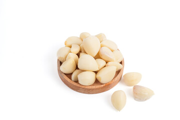 garlic in wooden container isolated white background. Perfect for recipes, articles or any cooking content.