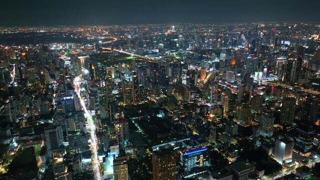 Amazing night scene of illuminated downtown skyscrapers. Modern urban town business buildings and skyscrapers. 