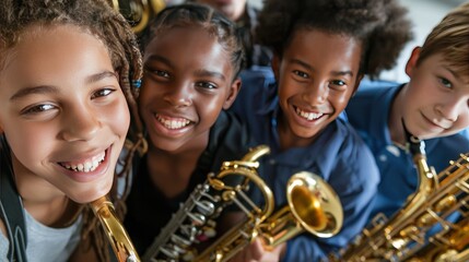Young musicians smiling with instruments.