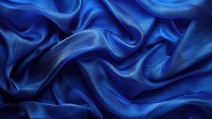 Fototapeta premium Royal Blue Silk Drape: A luxurious, flowing expanse of royal blue silk, its soft, rippling folds create a captivating backdrop