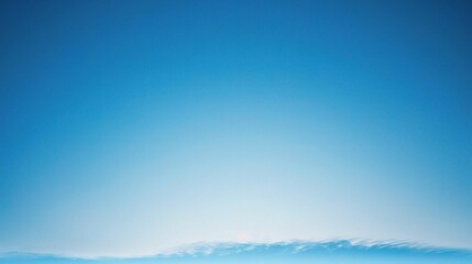 Fototapeta premium Azure Horizon: Serenity and Tranquility in a Vast, Unblemished Sky