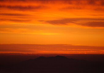 Burning sunset on the mountain