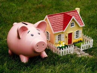 money safe next to a property, coins, financing. Generative AI.