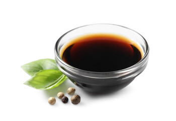 Delicious balsamic vinegar, basil and peppercorns isolated on white