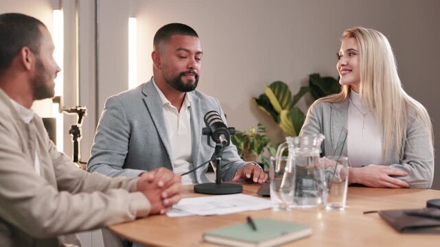 Studio, podcast and people for interview with microphone, sharing ideas and streaming show for broadcast. Equipment, man and woman with podcaster for content creation, topic questions and discussion
