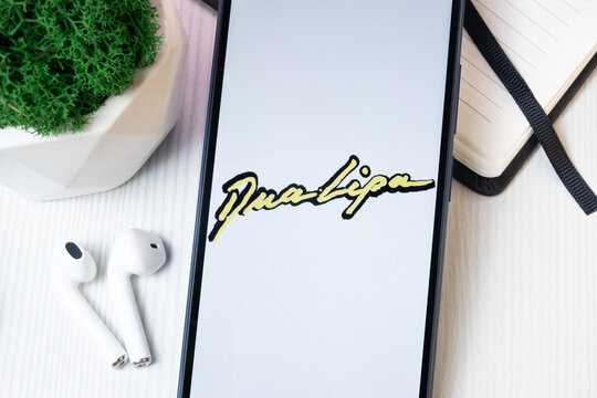 New York, USA - 1 August 2024: Dua Lipa Logo on Phone Screen, Music Icon on Display