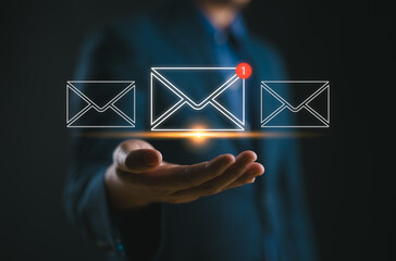 Businessman receives email notification, business email communication and digital marketing,...