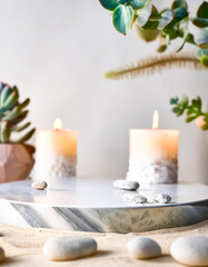 White Marble Platform With Candles, Rocks and Plants