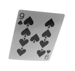 Flying playing card for poker and gambling, nine of spades isolated on white, clipping path