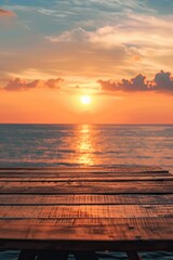 A wooden table standing out on a serene sunset background
