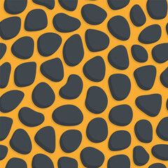 seamless pattern of black colored stones, on a yellow background like leopard skin