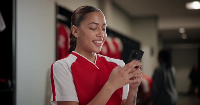 Sport, woman and happy in locker room with phone, social media and check training schedule. Football player, girl and smile at mobile for good news, league acceptance and favorite soccer team update