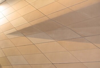 3 dimensional futuristic interior wall clad with shaped tiles, real