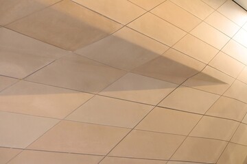 3 dimensional futuristic interior wall clad with shaped tiles, real