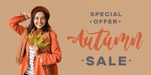 Banner for autumn sale with with young woman holding fallen leaves