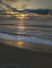 sunset on the beach urbanova on Alicante in Spain.