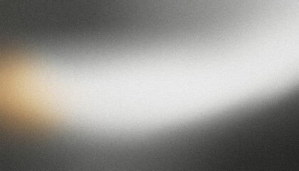 Obraz premium Abstract background with a grainy texture, featuring a smooth gradient from black to white with gold accents