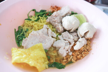 Chinese noodles, egg noodles or pork noodles with pork ball