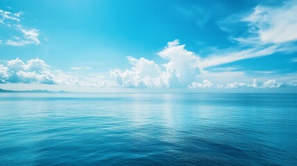 Obraz premium The sky is blue and the water is calm