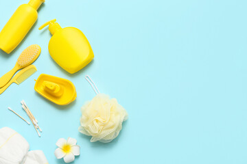 Composition with cosmetic products and bath accessories for baby on color background